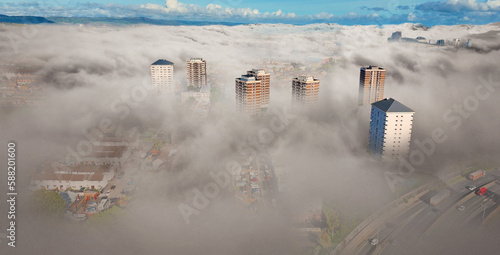 Aerial Photo of The Divis high rise flats Belfast Northern Ireland in fog mist 