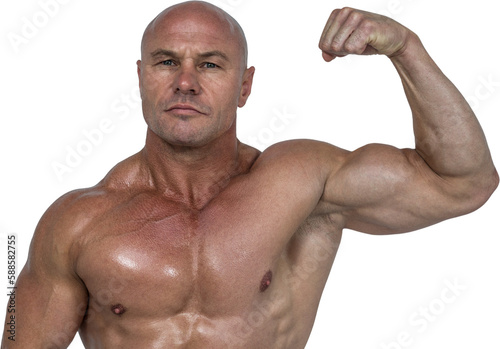 Portrait of muscular man flexing bicep