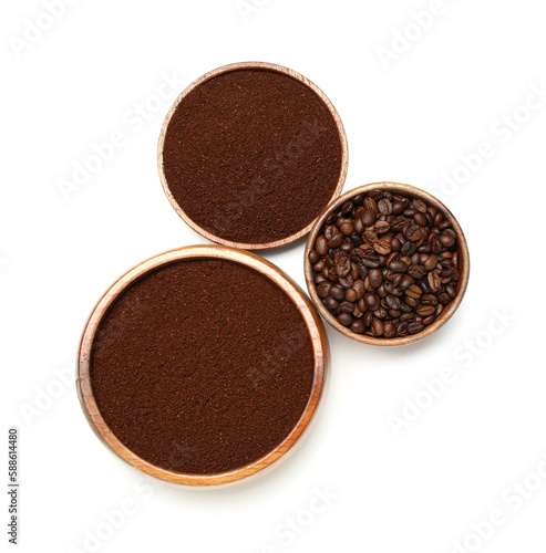 Bowls of coffee powder and beans isolated on white background