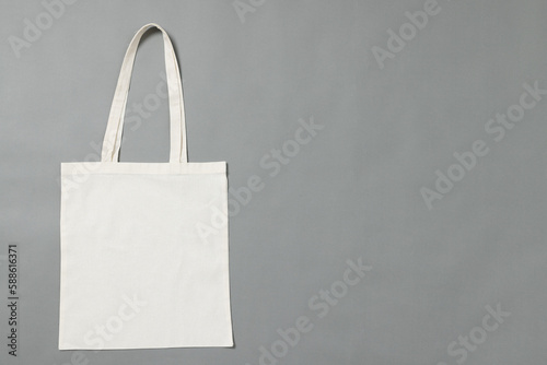 High angle view of white canvas bag with copy space on grey background