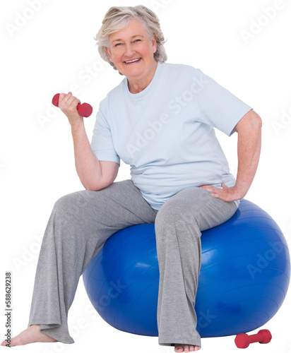 Senior woman sitting on exercise ball