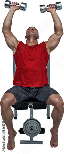 Healthy man lifting dumbbells while sitting on bench press