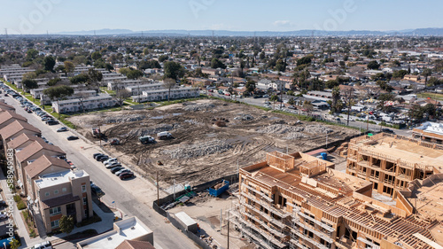 Afternoon aerial view of demolition and new construction in downtown Watts, California, USA.