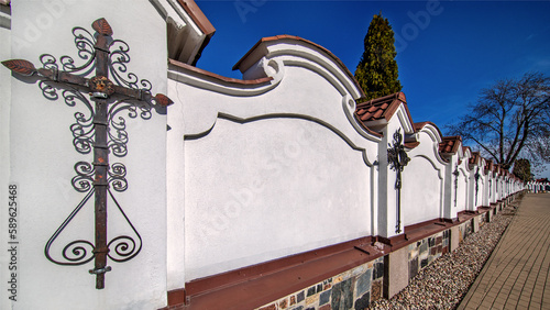 Columbarium built into the wall surrounding the cemetery of Saint Roch, view from Konstytucji 3 Maja Street in the city of Białystok in Podlasie, Poland.