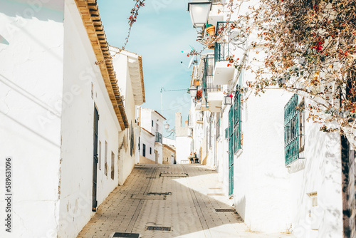 Altea old town with narrow streets and whitewashed houses. Architecture in small picturesque village of Altea near Mediterranean sea, Alicante province, Valencian Community, Spain
