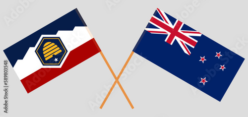 Crossed flags of New Zealand and The State of Utah. Official colors. Correct proportion