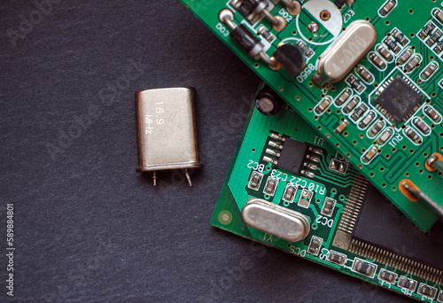 A crystal oscillator (16 Mhz). Frequency-determining element in digital electronic circuit boards.