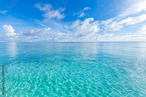 Crystal clear sea water bay. Pristine ocean lagoon sunny cloudy sky, idyllic relaxing seascape. Transparent surface, exotic travel. tropics Mediterranean nature panorama. Summer background, beach view