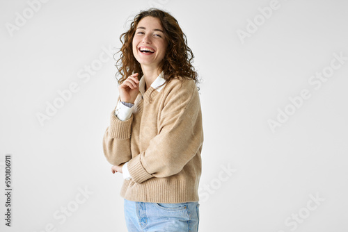 Young adult smiling beautiful charming positive woman model, joyful satisfied pretty cheerful cute curly girl student looking at camera laughing, standing isolated at white background, portrait.