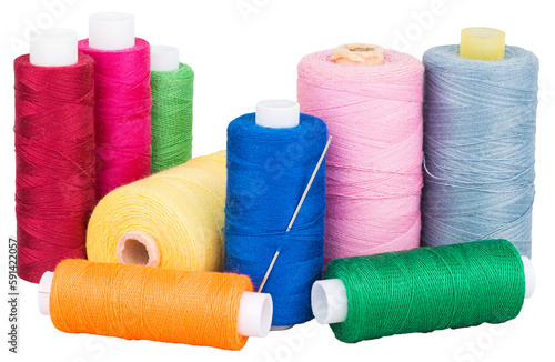 Spools with colorful thread and needle for sewing, supply for sewing, isolated objects on transparent background