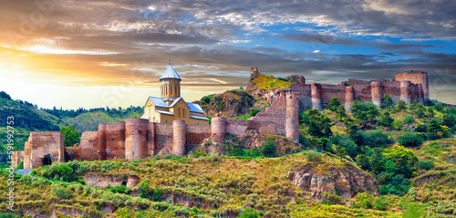 Picturesque sunrise over the ancient Narikala fortress in the city of Tbilisi