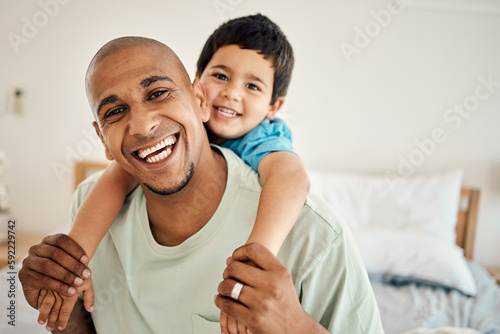 Happy family portrait, bonding and child hug father, papa or dad for morning affection in hotel bedroom. Vacation happiness, piggyback or face of smiling man and youth kid enjoy quality time together