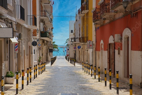 Aerial view of narrow street surrounded by buildings in Manfredonia