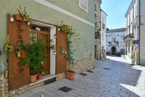 A narrow street among the old houses of Larino, a medieval town in the province of Campobasso in Italy.