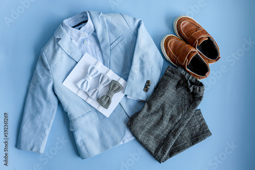 Stylish outfit for a boy, top view, flat lay