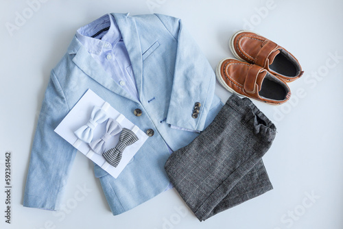Stylish outfit for a boy, top view, flat lay