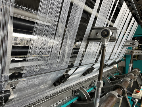 Industrial knitting machine for knitting textile fabrics