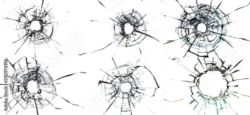 Bullet holes and cracks on white glass background