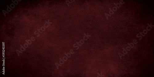 Abstract dark red wall texture and old grunge paper texture design. concrete cement plaster wall texture with banner panorama wide pattern, dark wallpaper. Dark scarlet color textured surface.