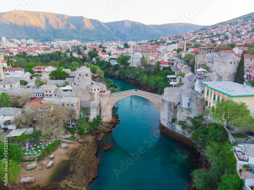 erial Mostar Bridge and Koski Mehmed Pasha Mosque drone view of the historical city of Mostar, Ottoman architecture view of Bosnia is the most beautiful city in Europe