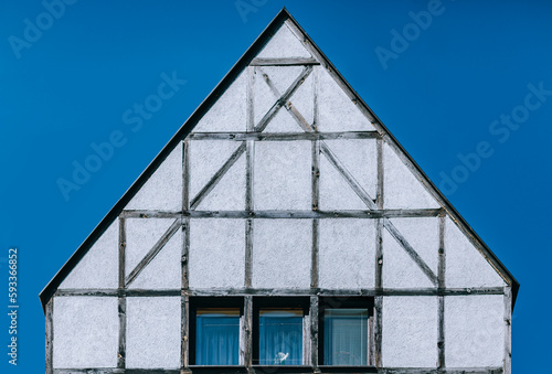 house with pointed roof and half-timbered wall 