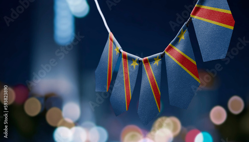 A garland of Democratic Republic of the Congo national flags on an abstract blurred background