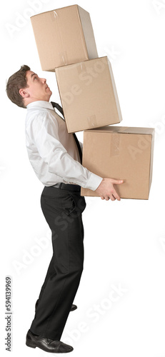 Businessman Carrying Pile of Falling Boxes