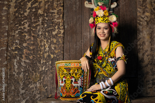 A Borneo lady showcasing the beauty of her culture through her stunning traditional clothing