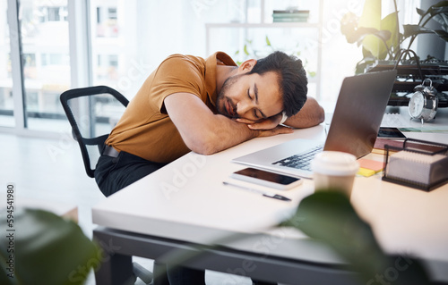 Tired, business man and sleeping at desk in office with burnout risk, stress problem and nap for low energy. Fatigue, lazy and depressed male employee with anxiety, overworked and bored in workplace