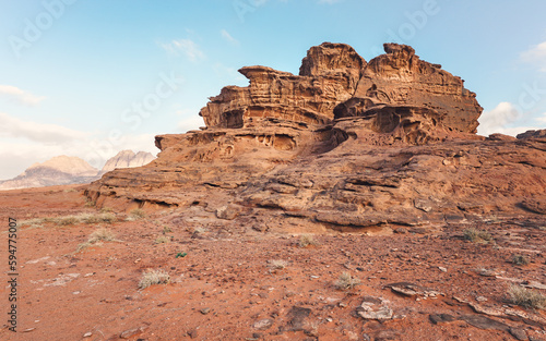 Red orange sandstone rocks formations in Wadi Rum also known as Valley of the Moon desert, Jordan