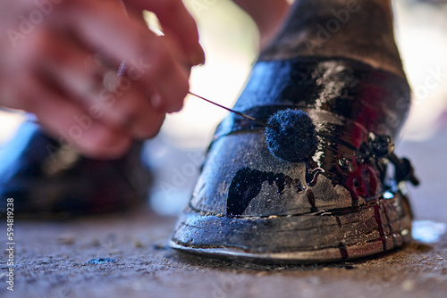 Painting Horse Hoof Black