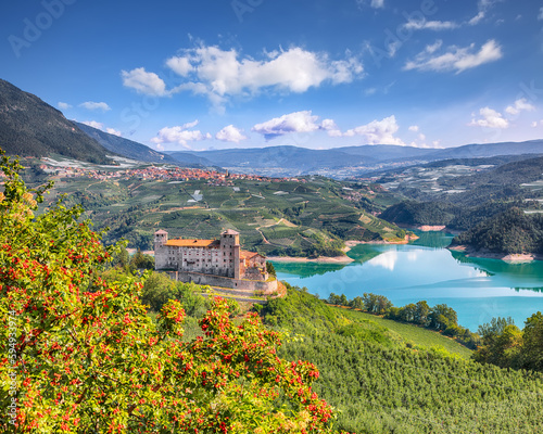 Fabulous View of the Cles Castel, the Santa Giustina Lake and lots of apple plantations.