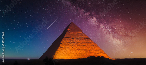 The Keops pyramid from Giza at fantastic purple night with the Milky Way in the sky