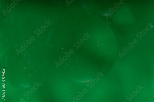 green abstract background with bubbles, macro photography