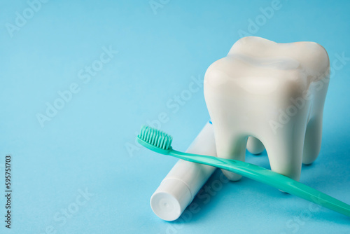 Toothbrush with toothpaste and white tooth