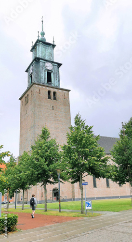 Tower of a Danish church with a clock