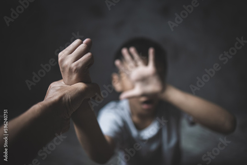 close up of little boy child stretch hand show no gesture protest against domestic violence, Childhood problem, Small teen child stand against discrimination or school abuse. voice concept.