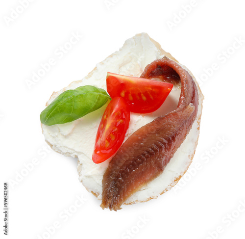Delicious sandwich with cream cheese, anchovy, tomatoes and basil on white background, top view