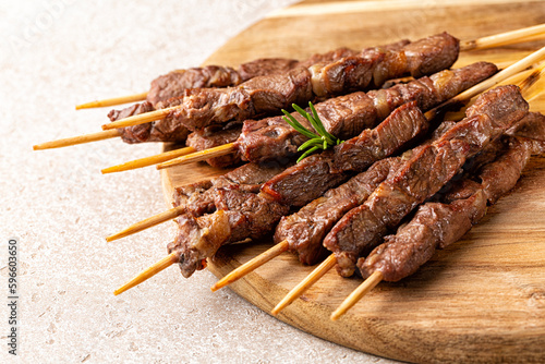  Italian lamb skewers or kebabs cooked on a brazier, with rosemary and spices. Arrosticini.