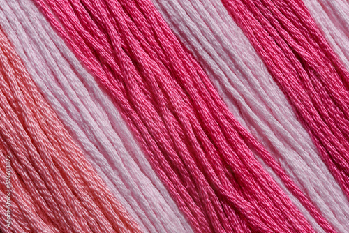 Tapeta tekstylna z różowej włóczka w różnych odcieniach w zbliżeniu makro