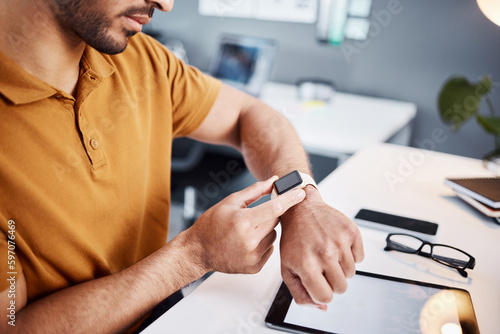 Time, notification and man with a watch at work for deadline, appointment or reading a message. Digital, technology and an employee with electronics for timing, organizer and connection in office