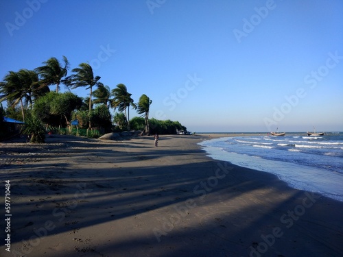 Sandy shoreline of Satin Martin Beach, Cox's Bazar. St. Martin's Island, locally known as Narkel Jinjira, is the only coral island and one of the most famous tourist spots in Bangladesh.