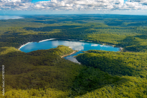 Aerial view of Lake McKenzie, Fraser Island (K'gari), a sand island along the south-eastern coast in the Wide Bay–Burnett region, Queensland, Australia.