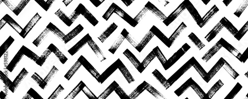 Seamless zigzag lines pattern. Brush drawn bold zig zag stripes. Geometric chevron abstract seamless banner. Tribal ethnic vector texture. Aztec geometric motif. Maze or labyrinth ornament.