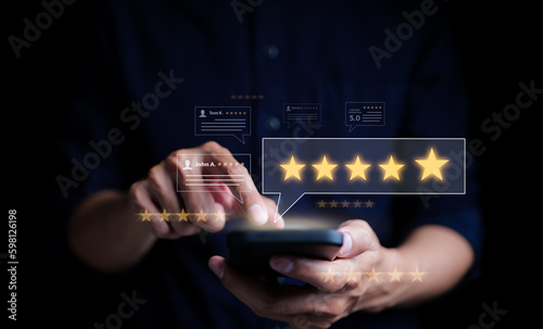 Customer review satisfaction feedback survey concept. User give rating to service excellent experience on mobile phone application, Client evaluate quality of service reputation ranking of business.