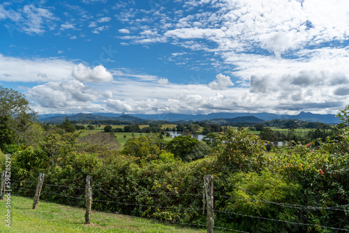 Panoramic view of the Tweed Valley, from Tweed Regional Valley, with mountains of Lamington National Park and Springbrook Plateau on the horizon. Murwillumbah, New South Wales, Australia