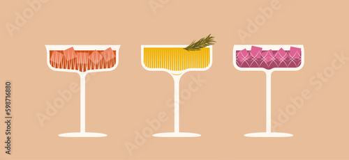 Vector illustration of a cocktails in crystal glasses with decoration. Festive glamour drinks in coupe glasses