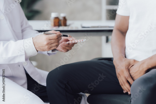 Man having appointment with STD specialist in clinic, closeup