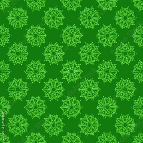 Seamless abstract tribal pattern in green colors.
