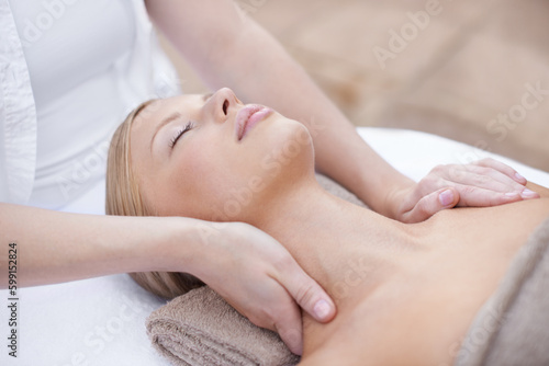 Hands of masseuse, woman getting neck massage in spa and wellness with peace, tranquility and holistic treatment. Stress relief, zen and female person at luxury resort with self care and body healing